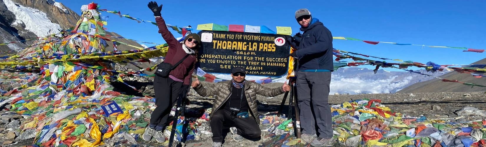 Clients on short Annapurna circuit trek at Thorong La pass